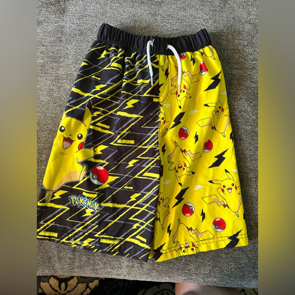 Pikachu swim trunks. Size 10